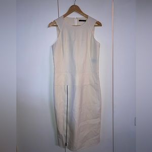 Donna Karan cream colored dress with front size zipper, made from Italian fabric